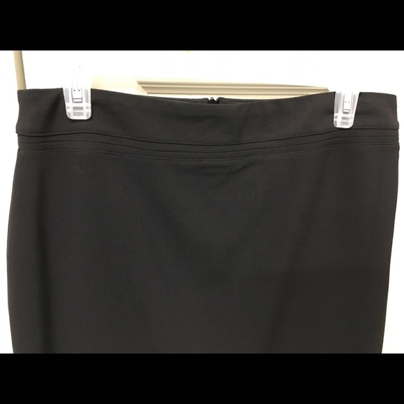 Black, lined, back zip skirt. Never worn. - Picture 4 of 5